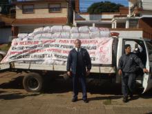 LOS CAZATAPITAS DEL MERCOSUR - camión listo para salir al depósito de Cofa junto al Jefe del Correo
